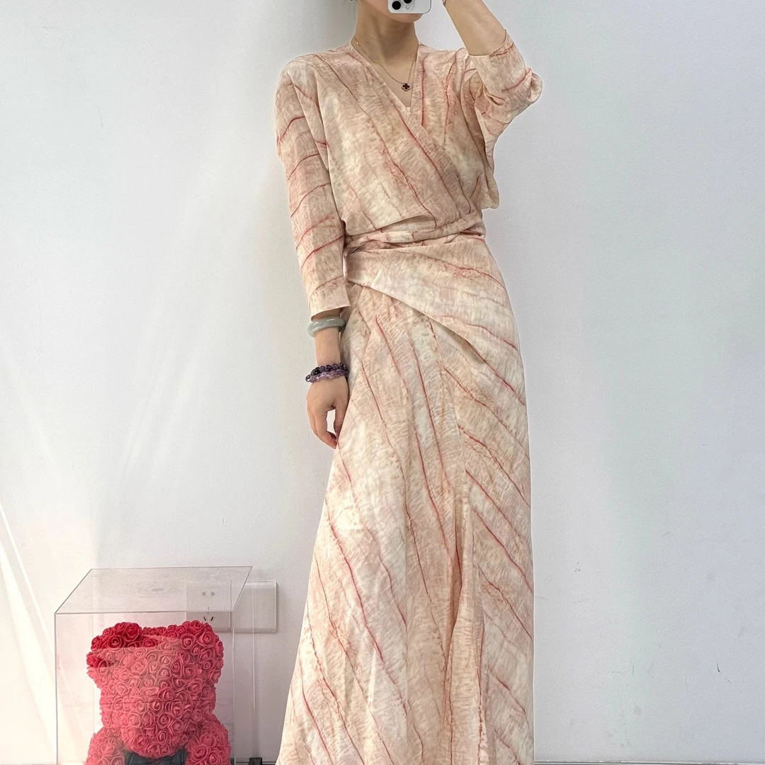 夏流行法式名媛长裙子女新款高级感海边度假温柔风印花V领连衣裙