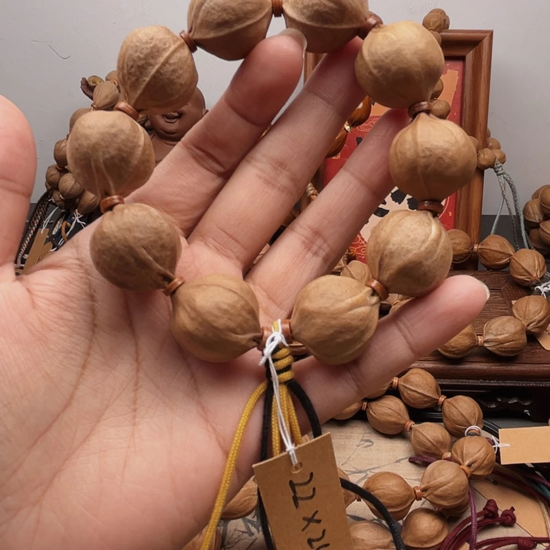 花***浪手串橄榄核22.24梅林铁核