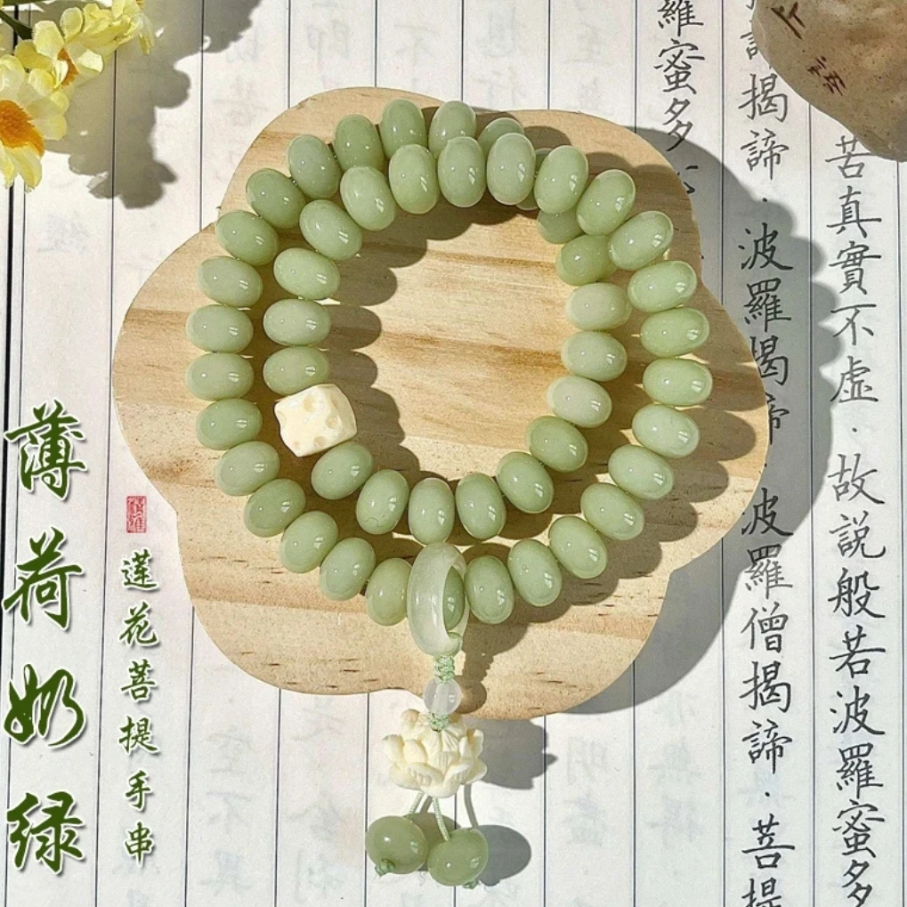 DT073原生态菩提 薄荷奶绿 7*10mm算盘珠双圈手串手持 莲花