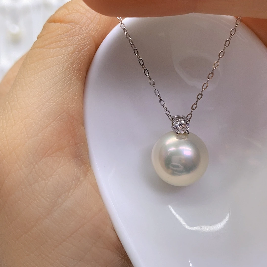 淡水珍珠银S925镶嵌吊坠(赠链)开**嘿