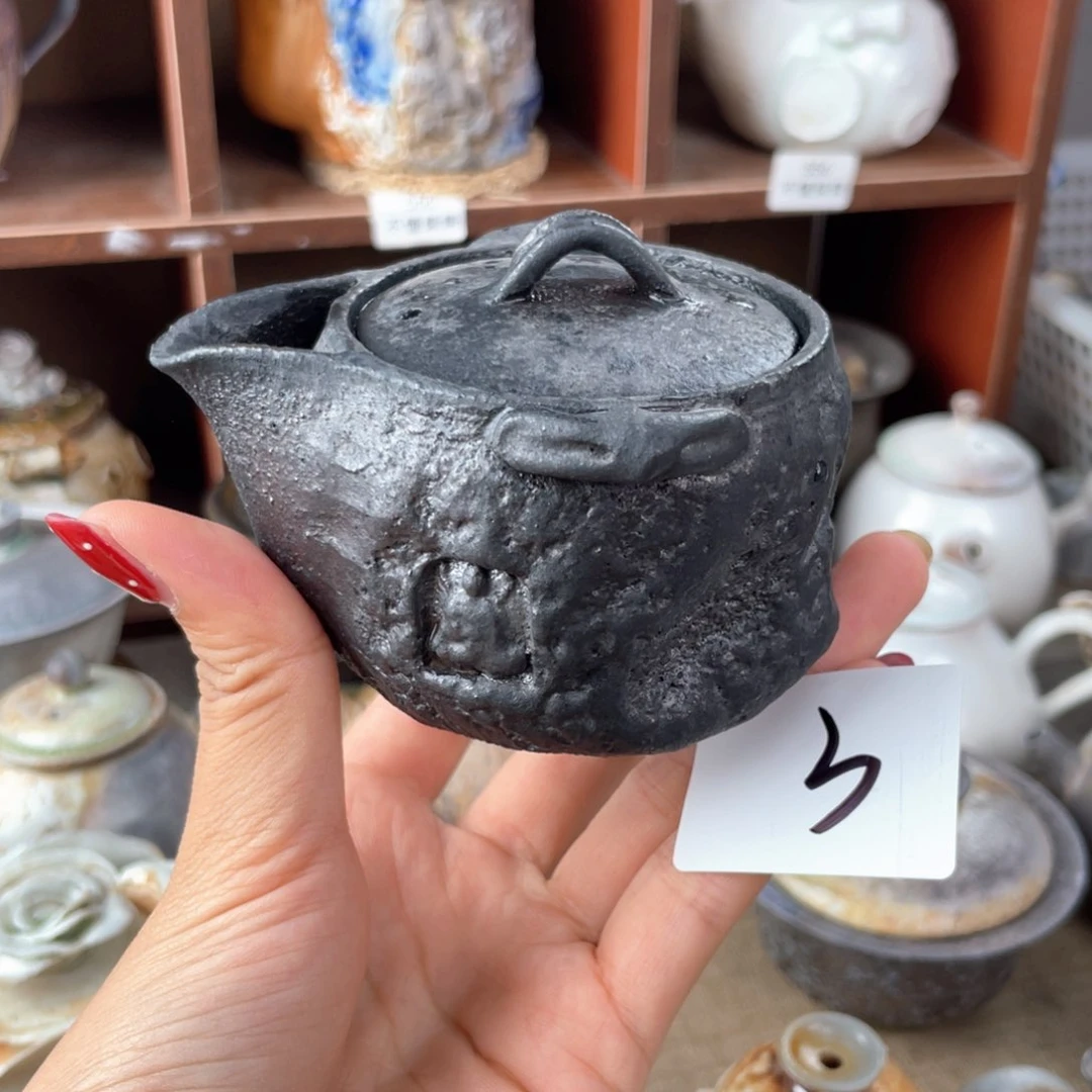 3手捏石窟紫砂宝瓶