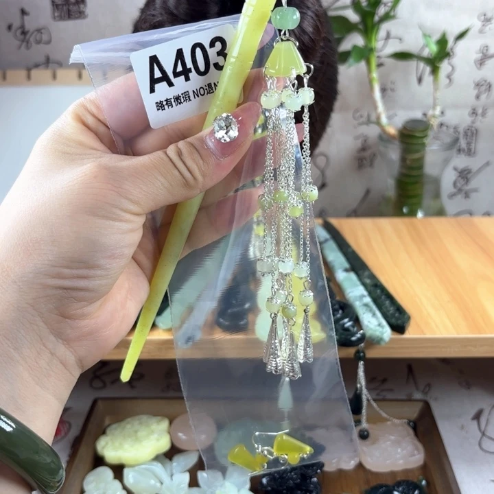 蛇纹石玉戒指合金和**筝