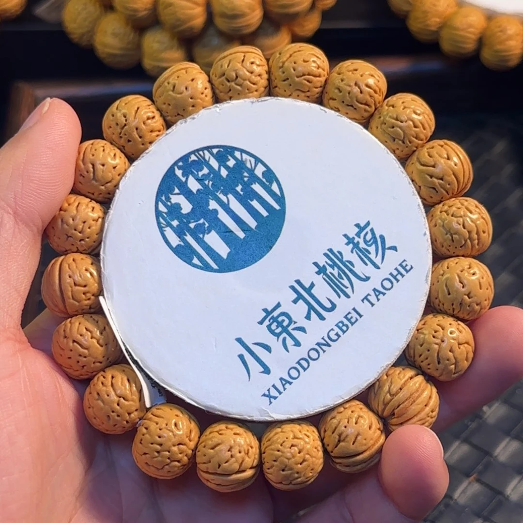 美***家桃核手串金丹精品