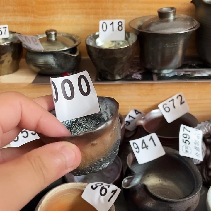 茶杯紫泥吞吞吐吐