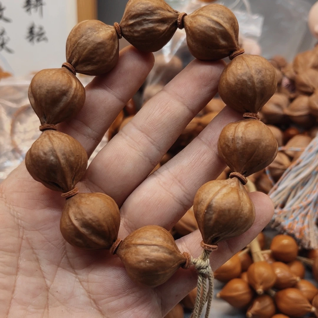 白***格手串/手链橄榄核22油核手串