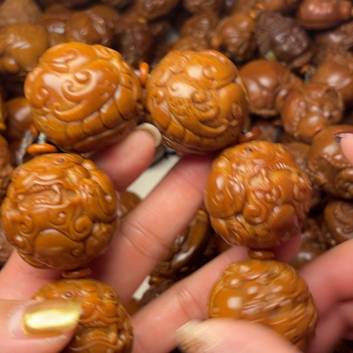 诸***鑫吊坠橄榄核橄榄核手持