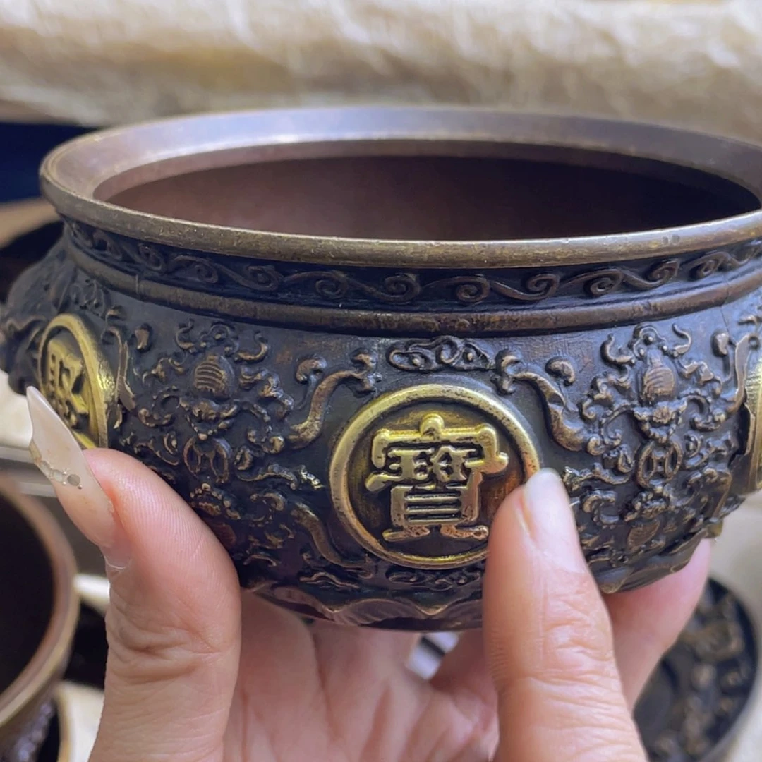 原矿风磨铜聚宝盆。