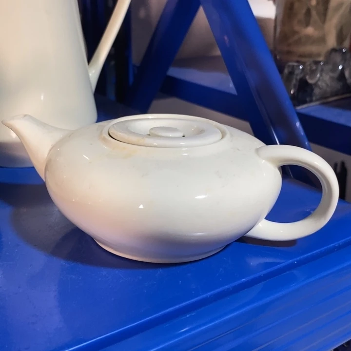 瓷片象牙瓷手把壶