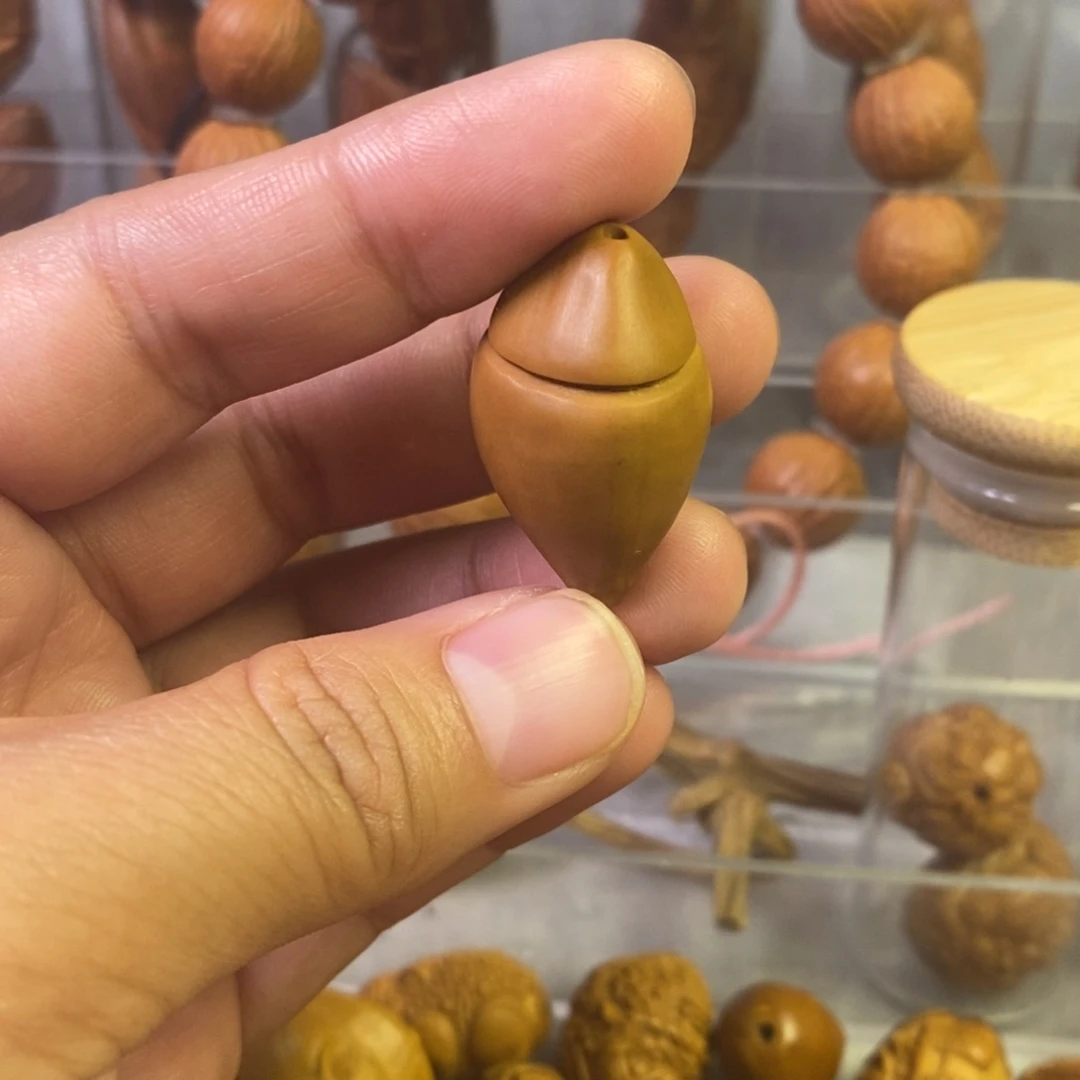 用***3橄榄核吊坠挑个核型正的，出入平安