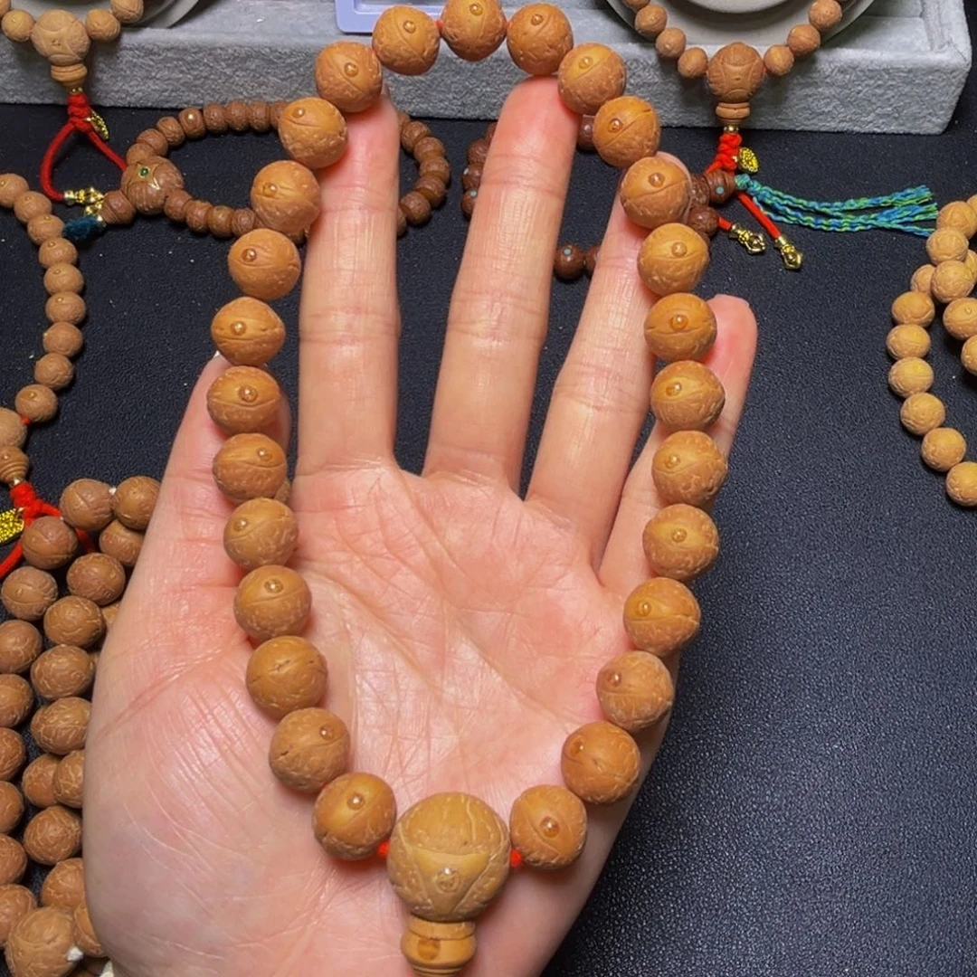 凤眼菩提吊坠12mm精品27颗手持