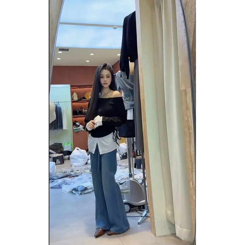 轻熟风气质设计感斜肩拼接假两件长袖上衣高腰百搭微喇休闲牛仔裤