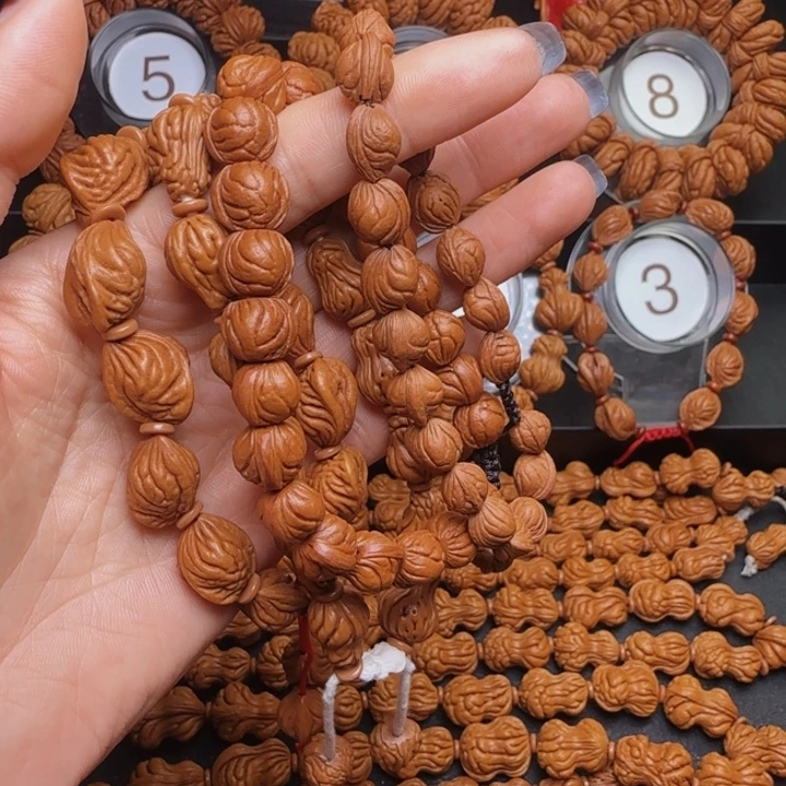 似***华桃核手串生命葫芦玉龙脊