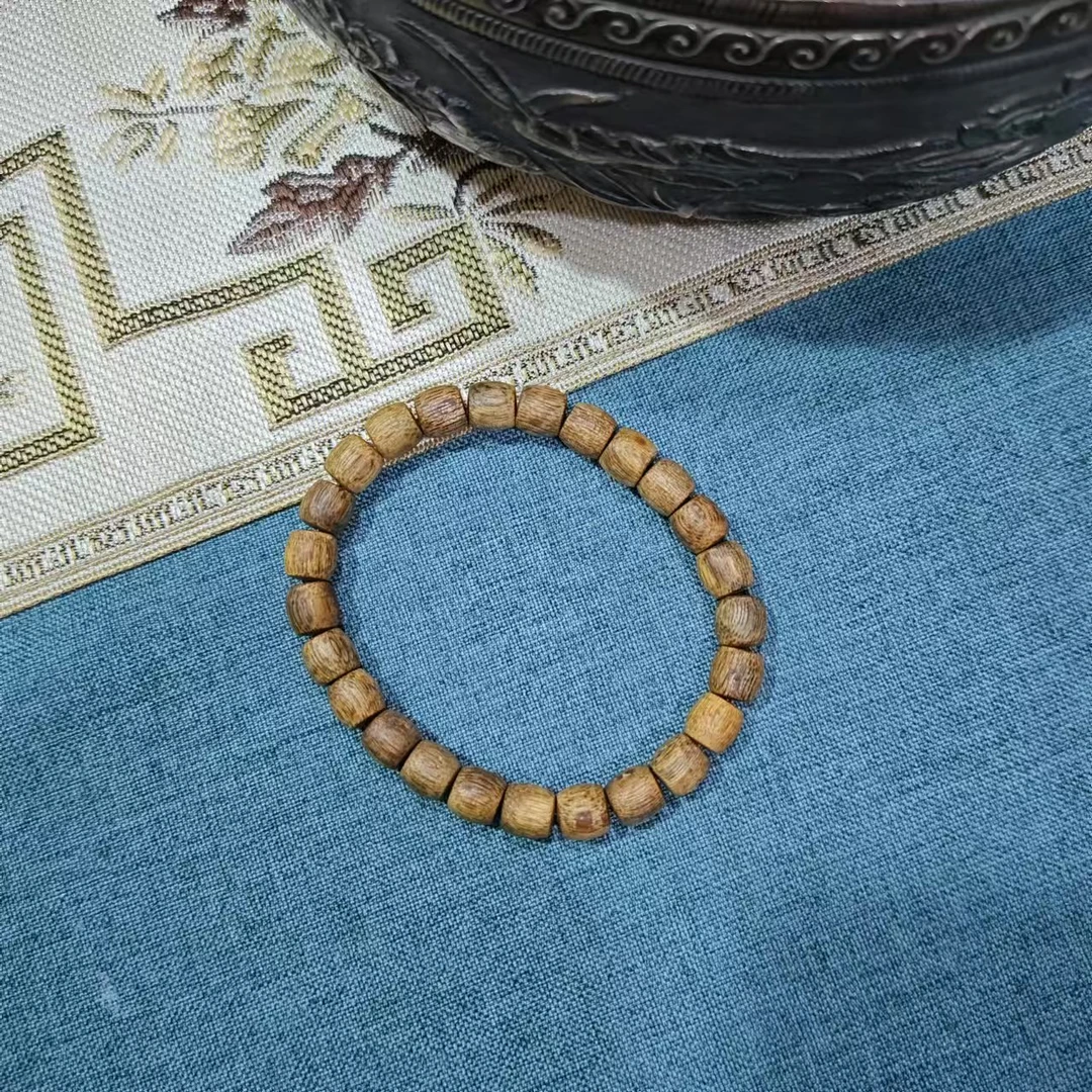 世间臻宝-海南黄棋楠八分沉桶珠手串/8MM/多样性发/P6511