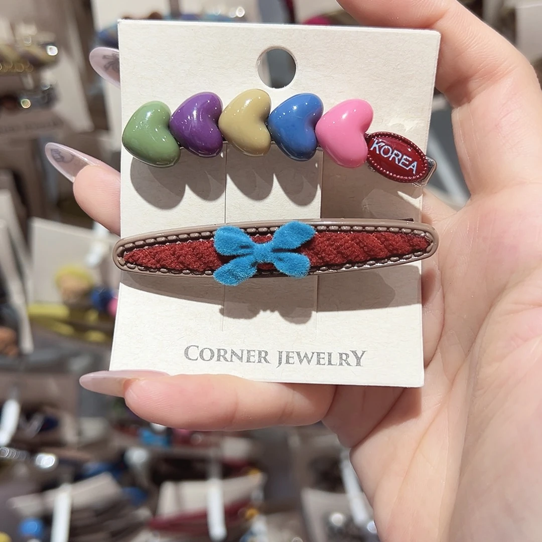 非金属仿珍珠爱心蝴蝶结鸭夹