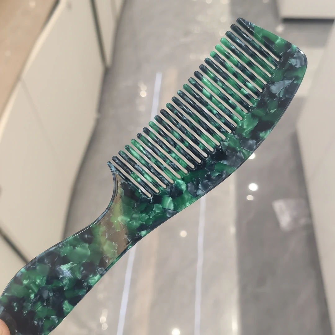F589绿色带腿梳子