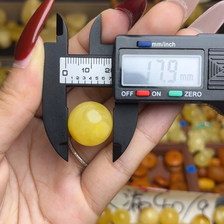 蜜蜡未镶嵌珠宝奇石鸡油黄满蜡妖花圆珠微瑕