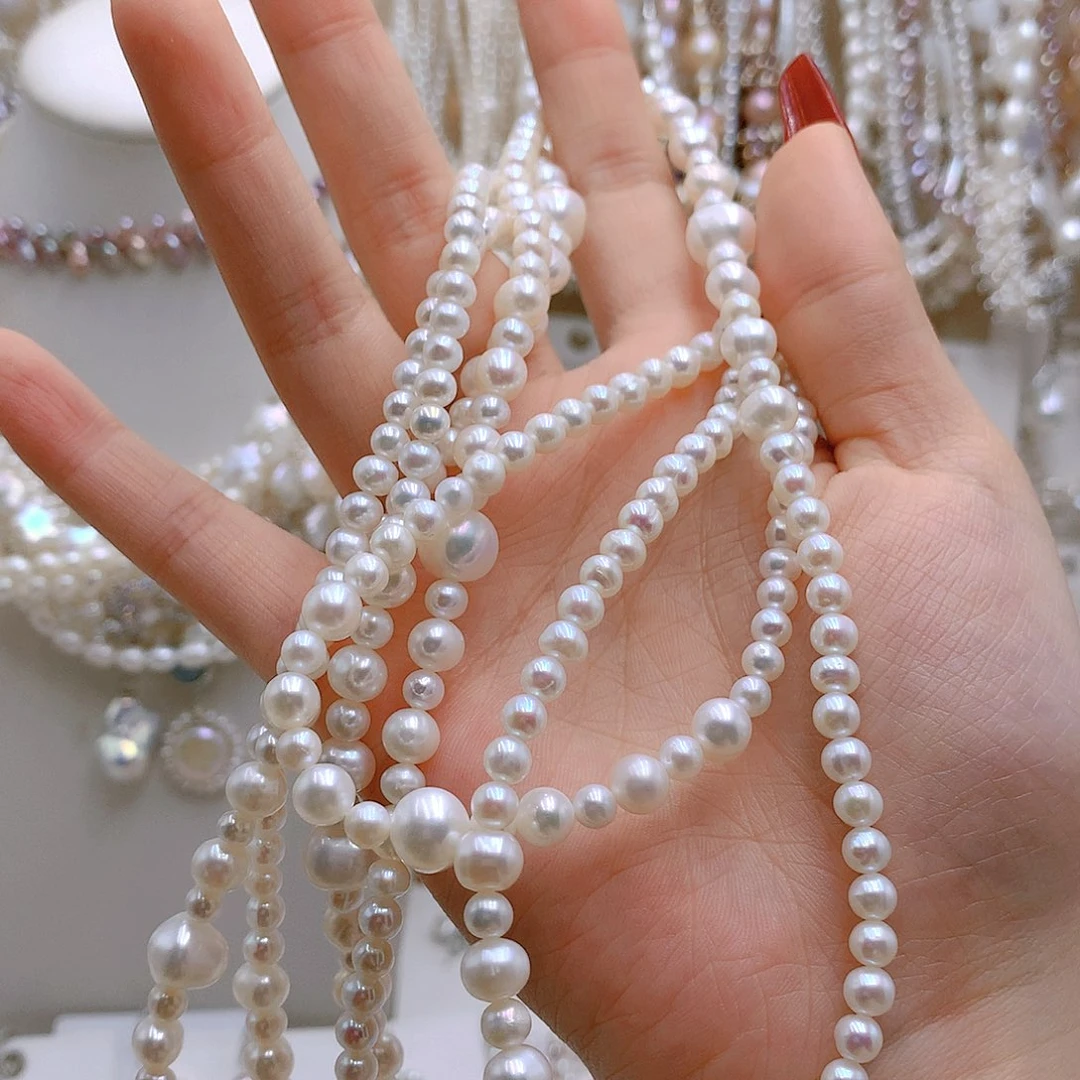 银S925镶嵌耳饰淡水珍珠灿**花