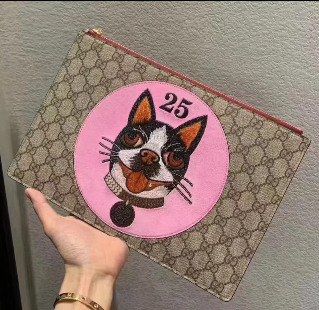 95新 GUCCI/古驰 古驰老花c1432狗狗手拿包