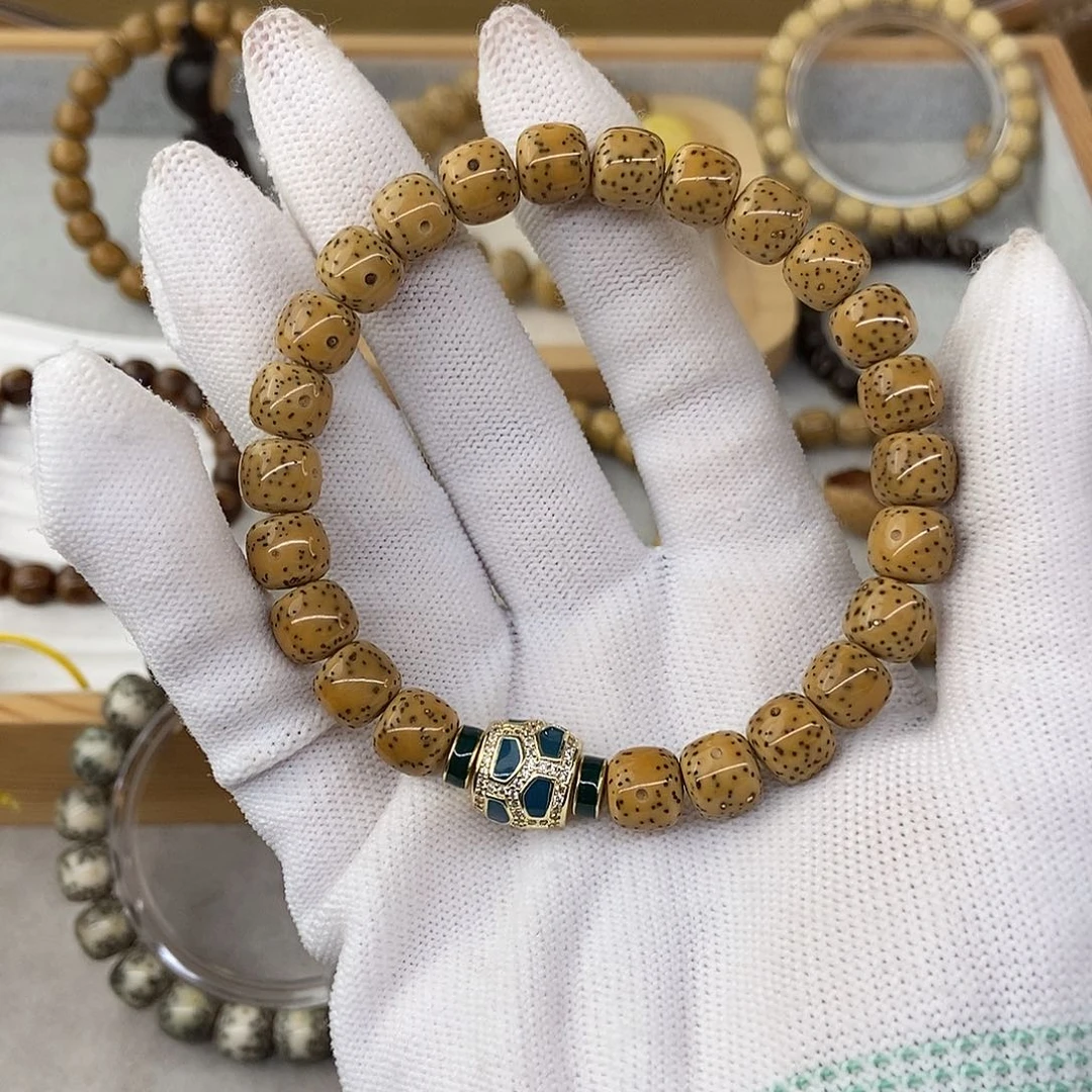 星月菩提手串多**?9鸡油黄