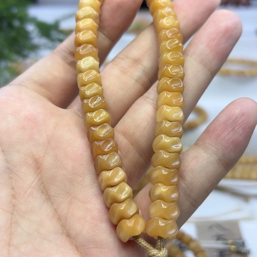 菩提根/象牙果手串强****?龙脊菩提雕刻龙骨玉化料