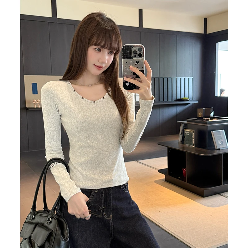 白色铆钉斜肩长袖t恤女2025秋季收腰内搭打底衫女外穿洋气显瘦