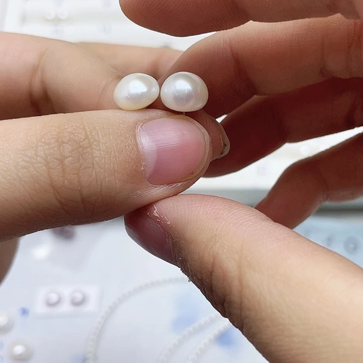 淡水珍珠耳饰银S925镶嵌虫*飞