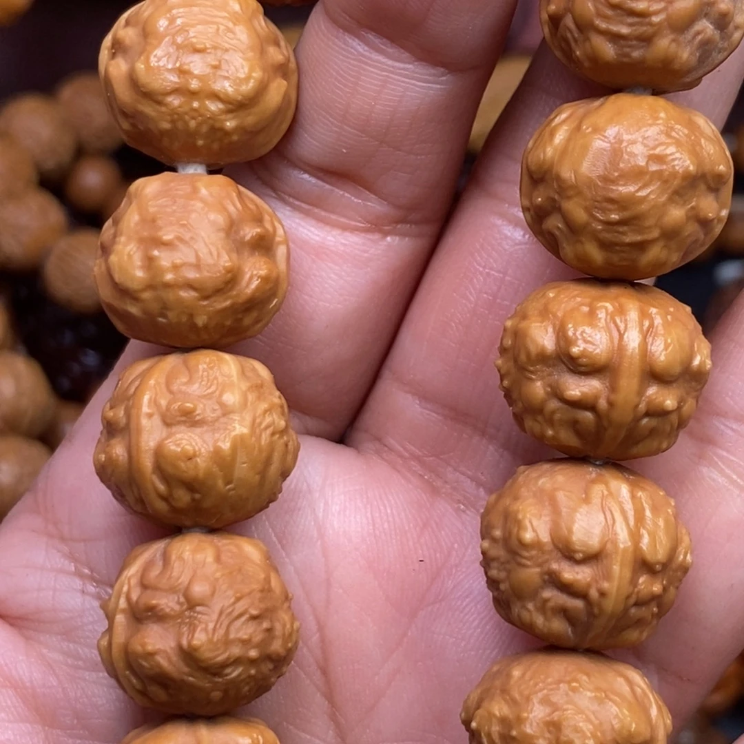 猴头核桃吊坠橄榄核雕刻手串