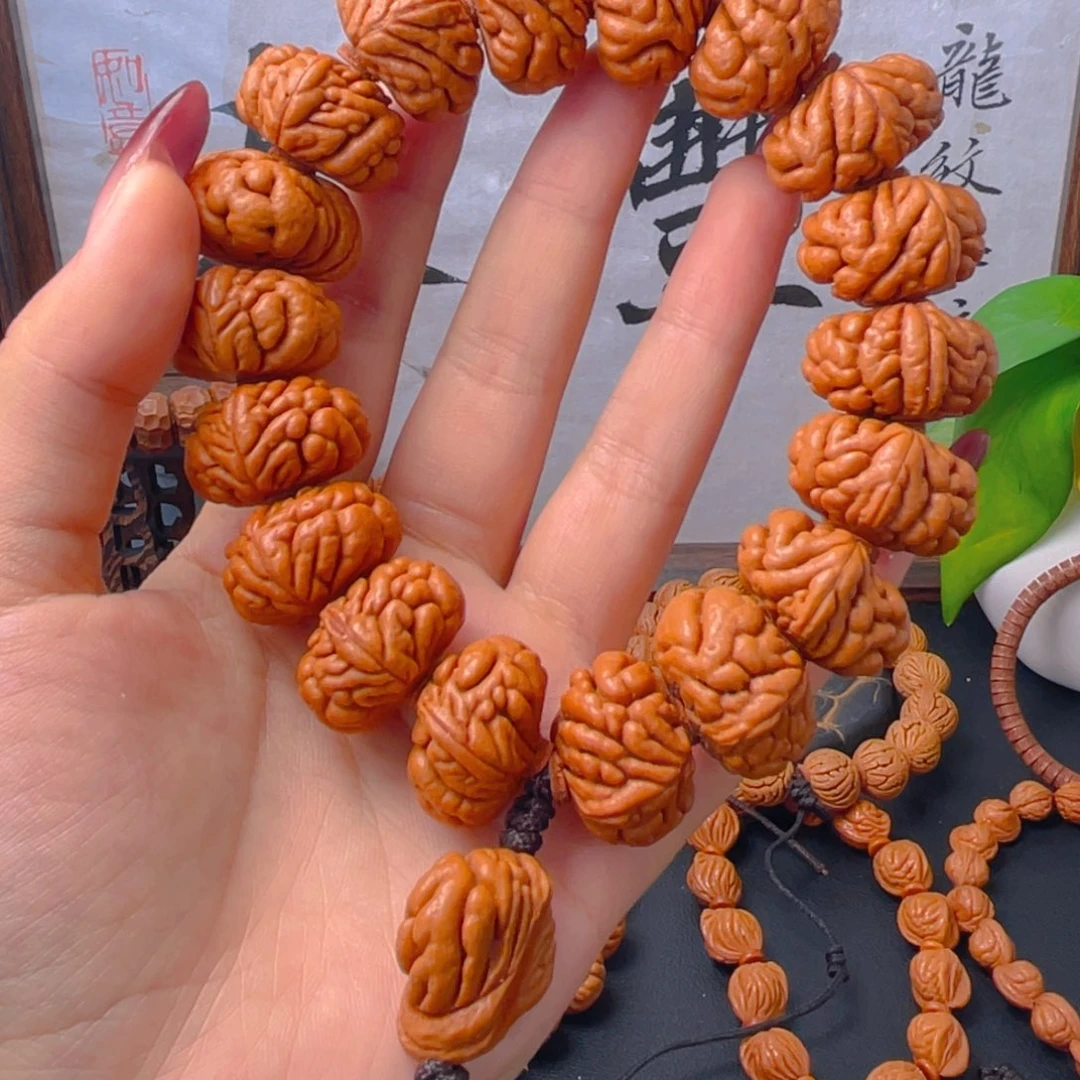 魔***方秦岭龙纹桃核手串