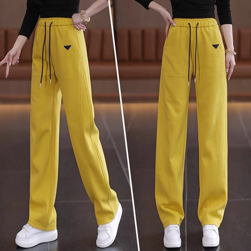 黄色裤子网红款2025新款阔腿裤女休闲弯刀卫裤宽松高腰显瘦直筒裤