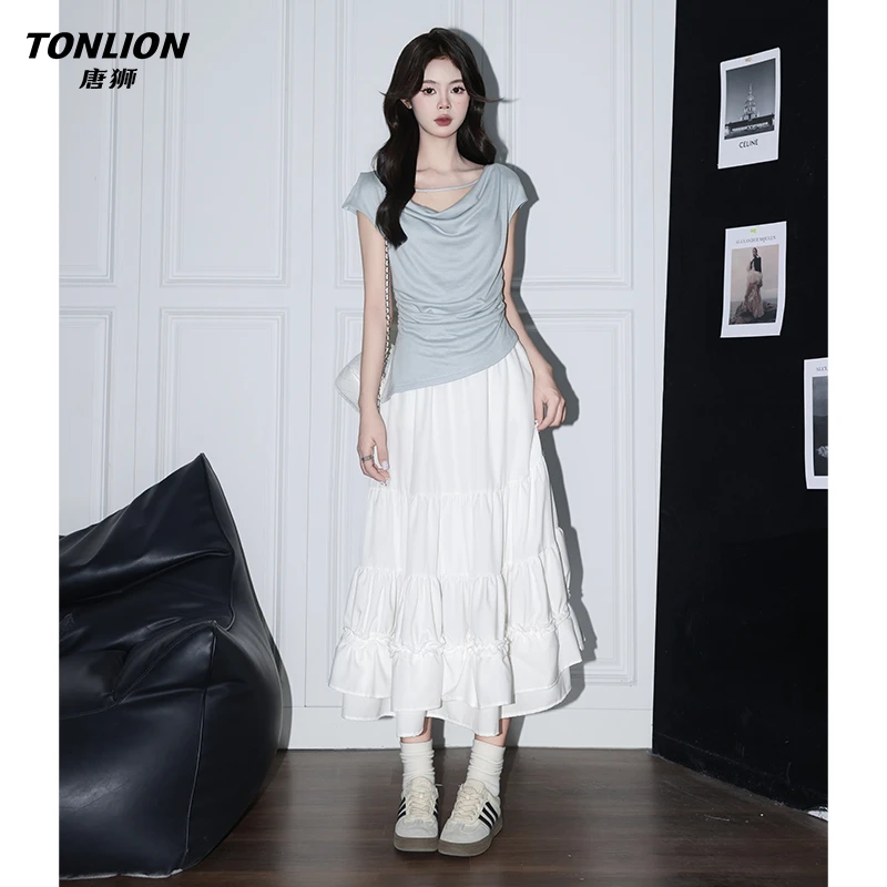 唐狮浅春系A字半身裙女2025春夏高腰韩系仙女裙白色蛋糕气质长裙