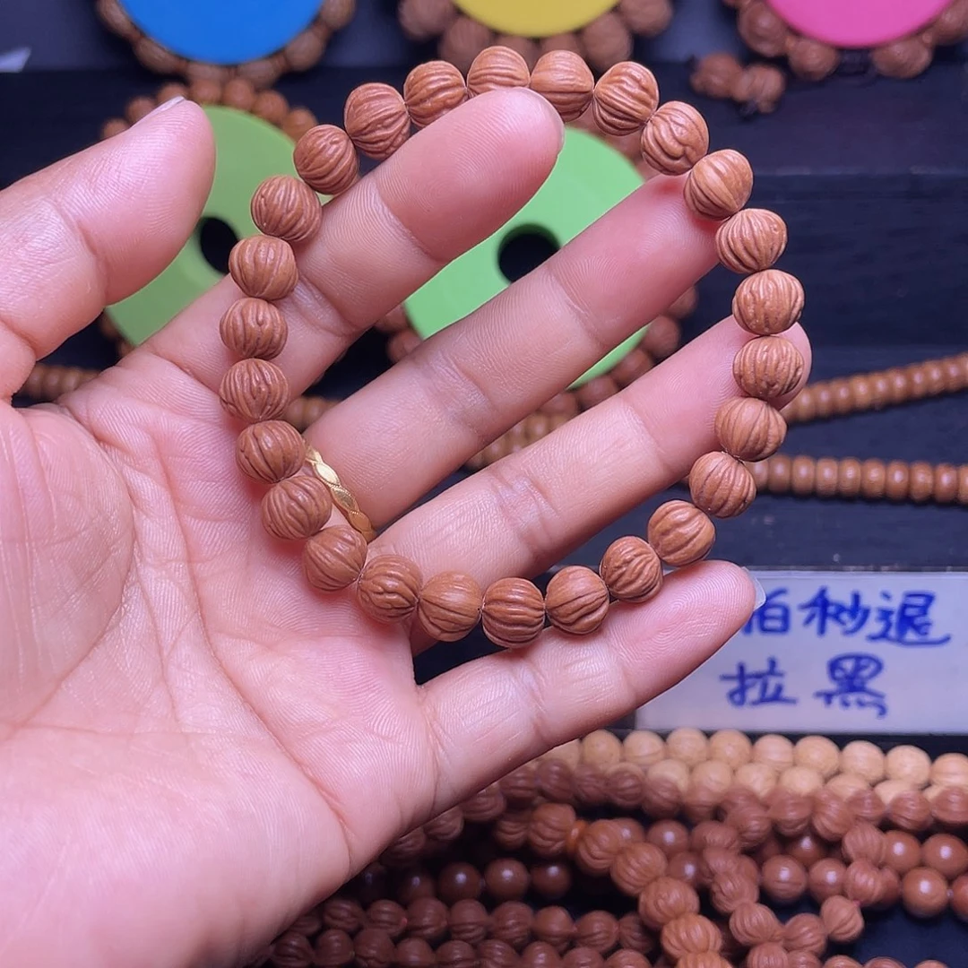 摄***价手串桃核秦岭龙纹桃核