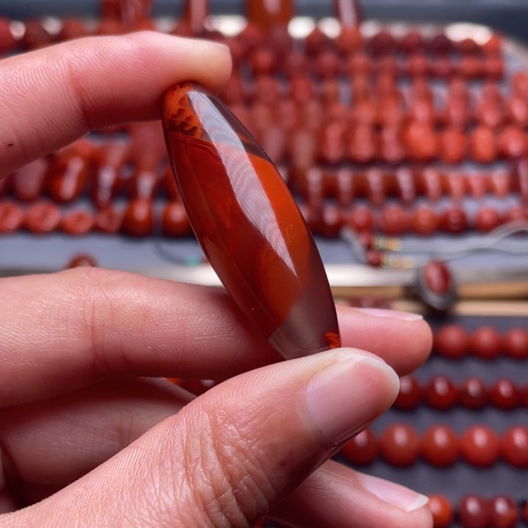 南红玛瑙未镶嵌其他W14.9*46瓦西牛血双色长桶珠