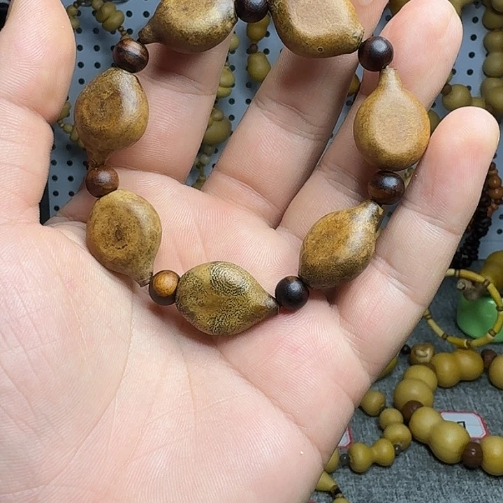 不***一花皮葫芦柠檬夹扁7颗手串