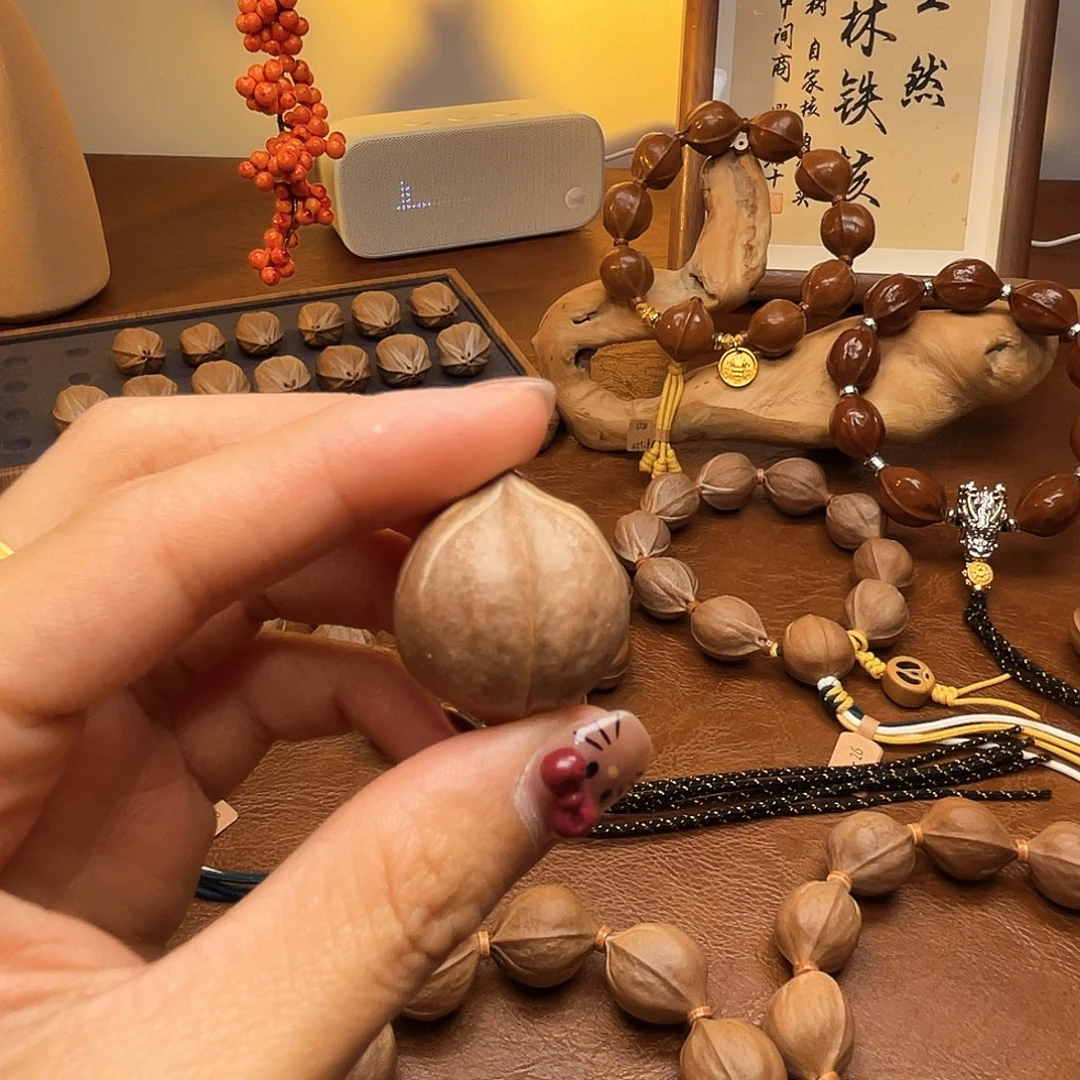 洛***神手串橄榄核梅林铁核单颗22*26