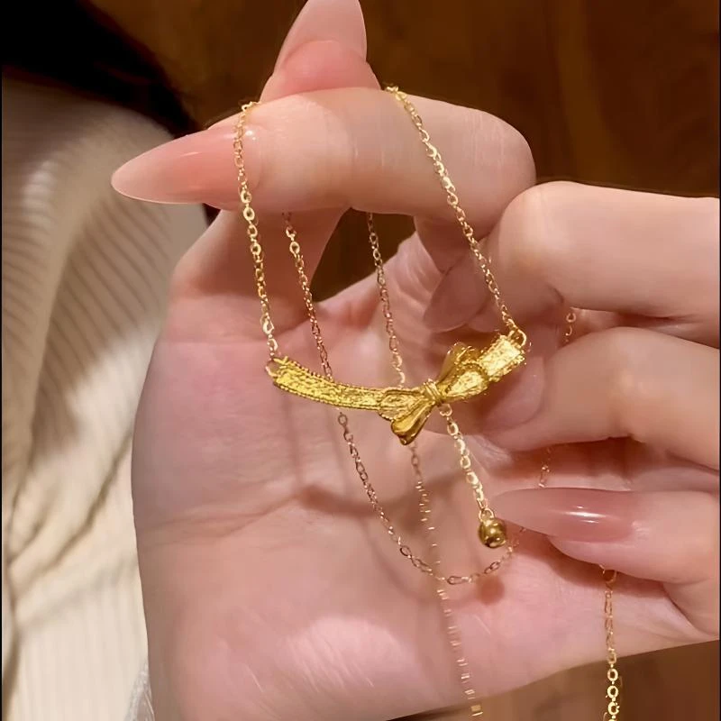 柯柒 钛钢项链 微笑蝴蝶结项链女轻奢小众ins高级设计感锁骨链