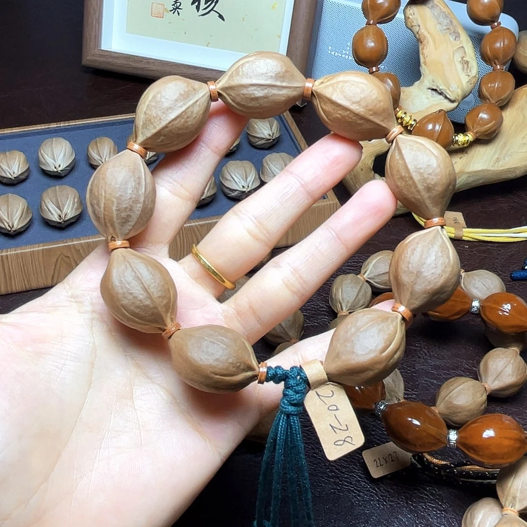 阿***星手串橄榄核梅林铁核20*28
