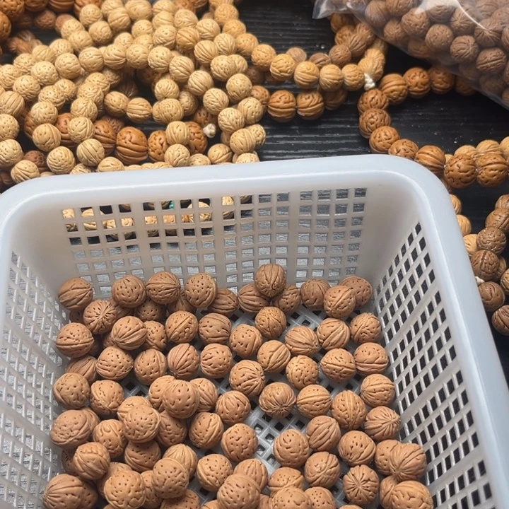 伤***事手串文玩核桃小桃核散籽批发