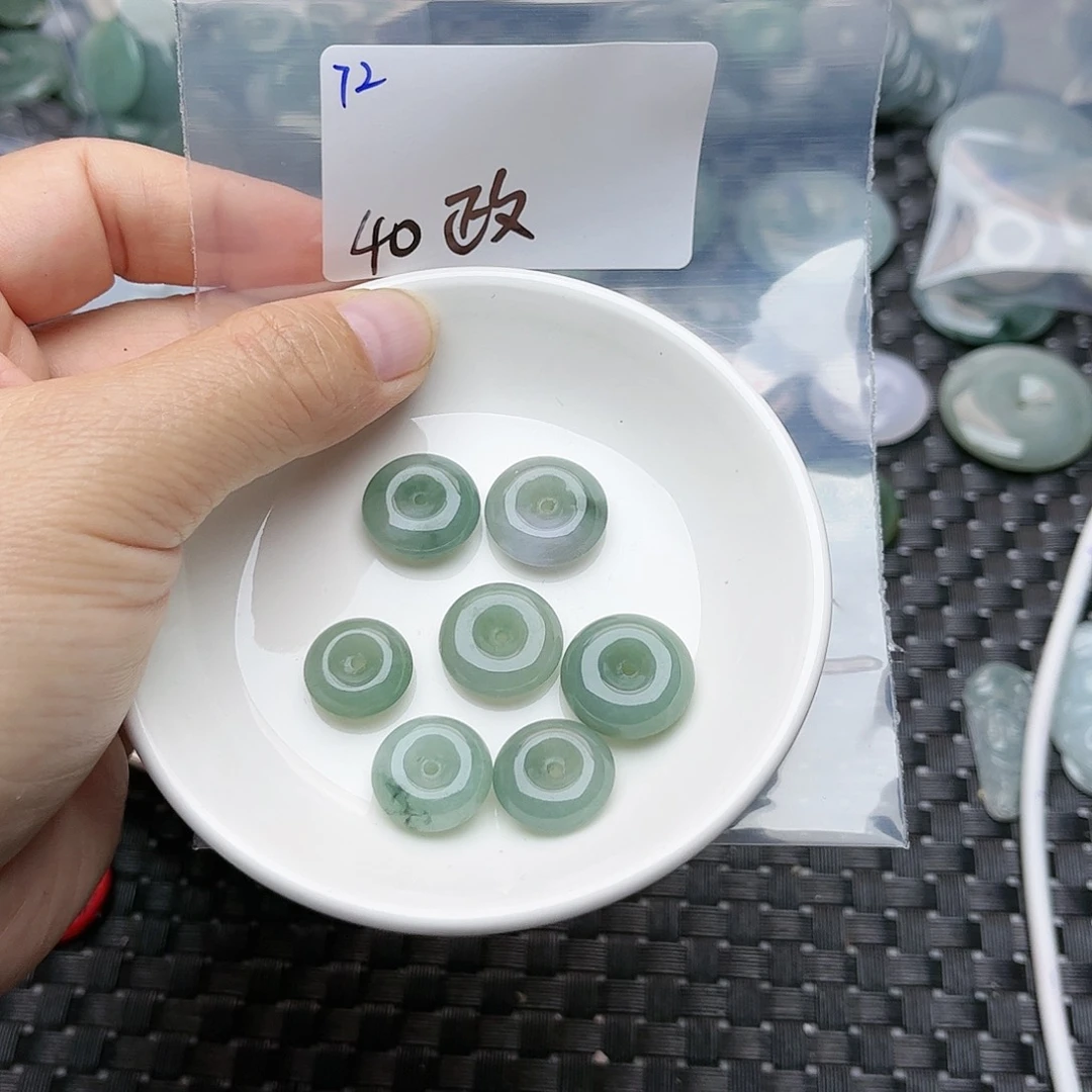 翡翠未镶嵌颈饰政*扬不