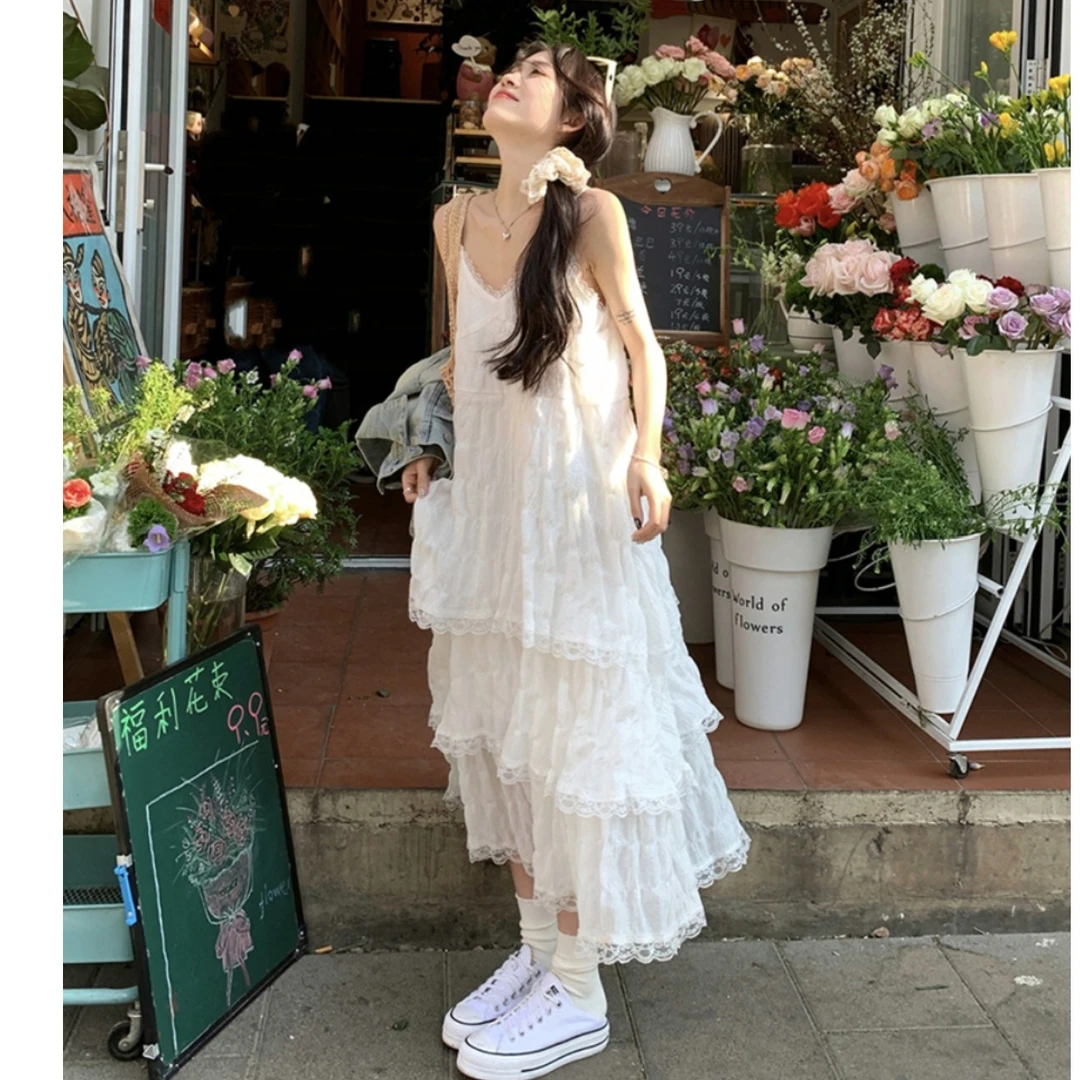 夏季新款白色性感连衣裙吊带长裙显瘦沙滩裙甜美气质复古聚酯纤维