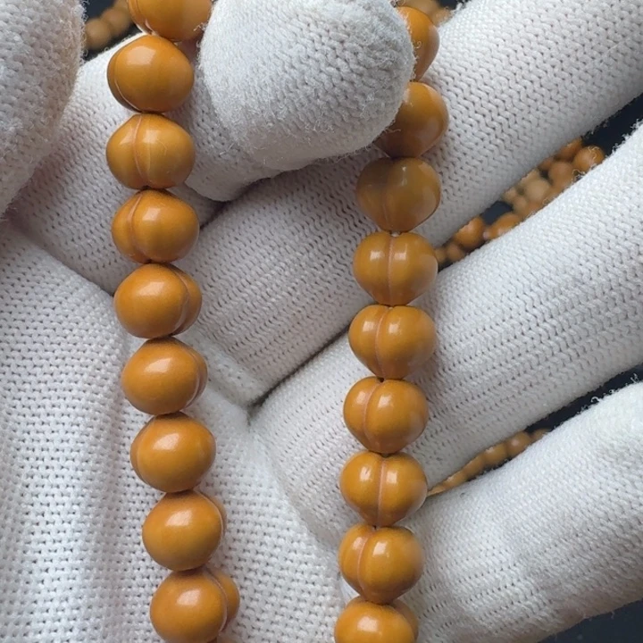 与***吞猴头核桃手串玻璃小屁桃