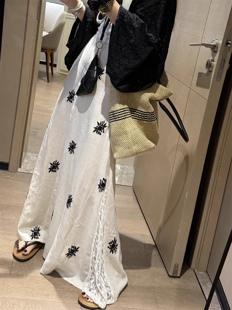 高级感印花蕾丝拼接a字半身裙女2025夏气质显瘦设计感松紧腰长裙