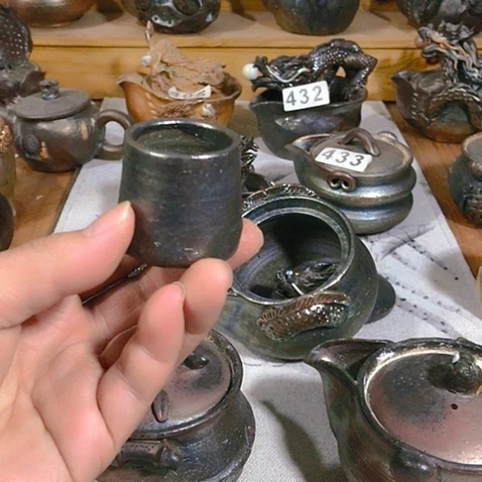 瓷片铁胎的小杯子