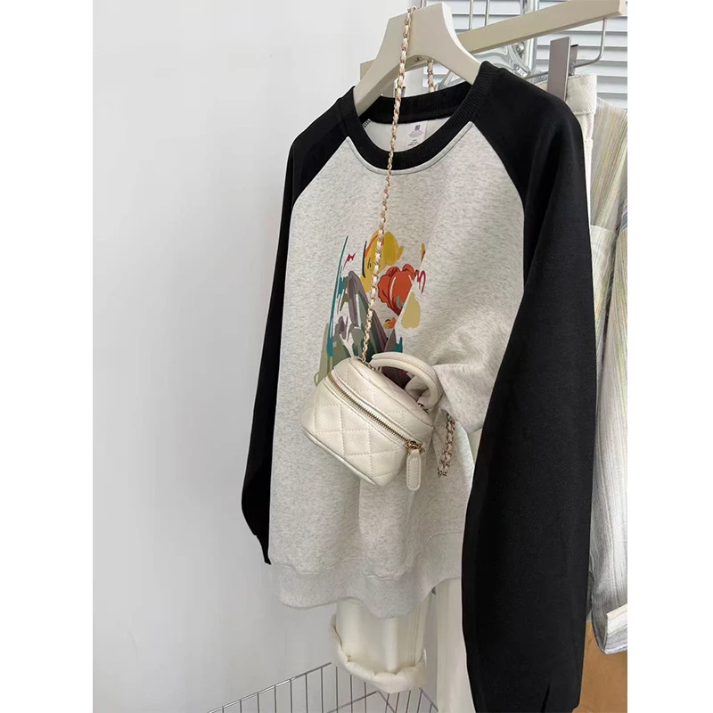 2025秋冬保暖撞色卫衣女圆领宽松纯色秋冬拼接插肩袖小众别致上衣