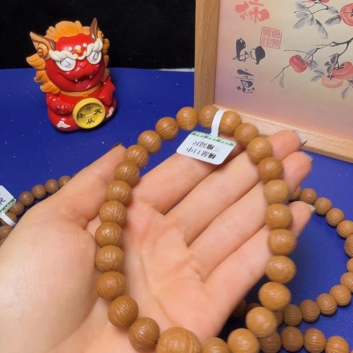 辉***)手串猴头核桃凤羽