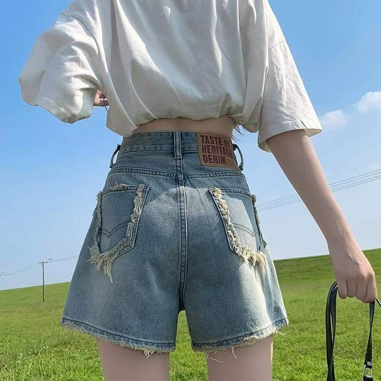 今年流行浅色毛边牛仔短裤女2025新款夏季小个子宽松a字阔腿热裤