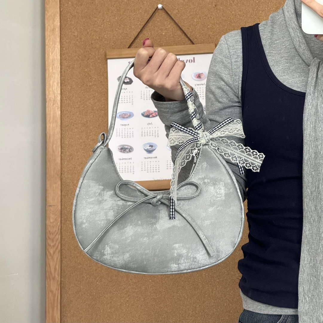 一张同学【长约23宽7高13单位厘米】时尚手提单肩斜跨包C3421银