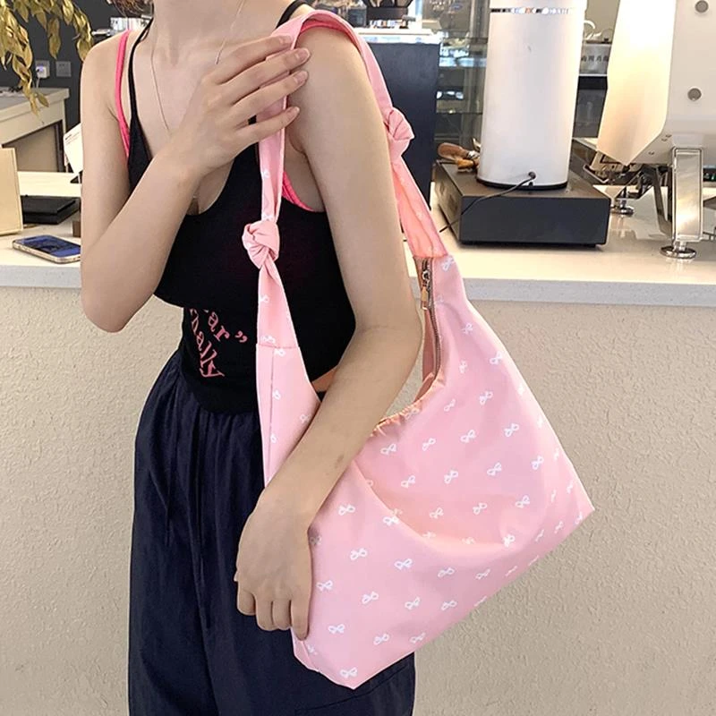 斜挎包设计感小众女粉色2024夏新款适合上班背的单肩包包轻便洋气