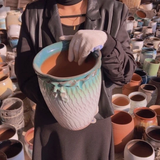 紫砂花盆高26口21。