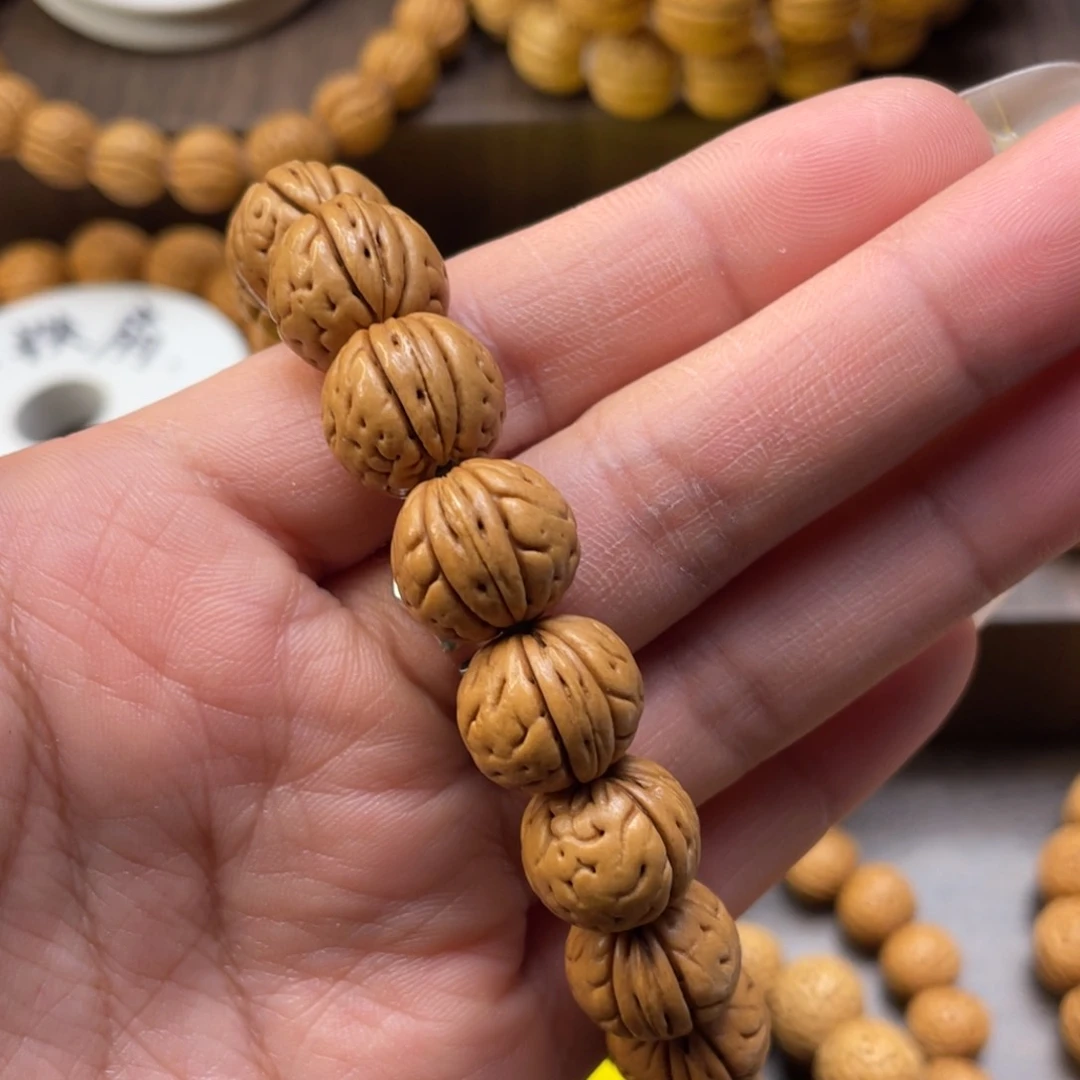 桃核手串自**风野生钢豆