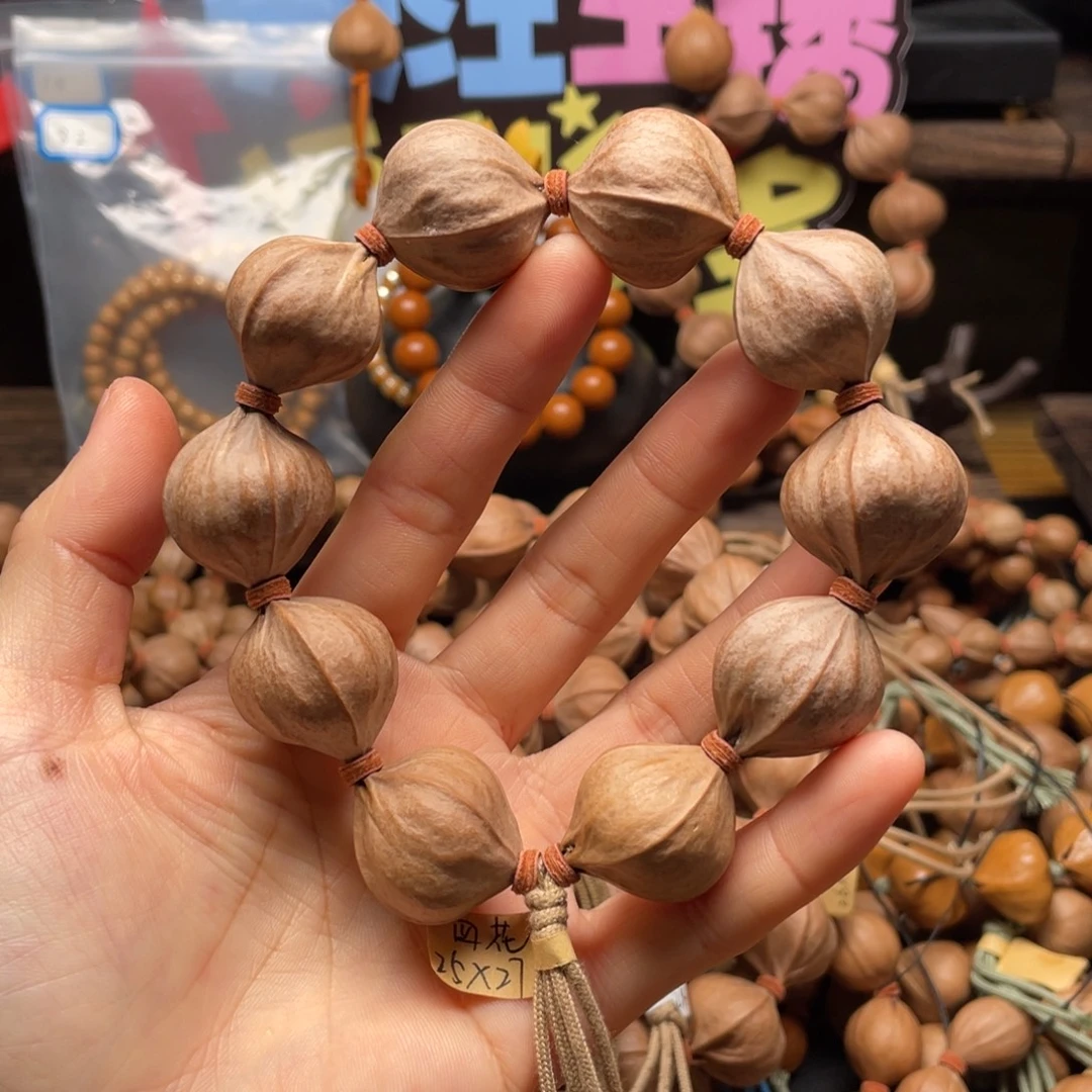 小***唐橄榄核吊坠2527四花